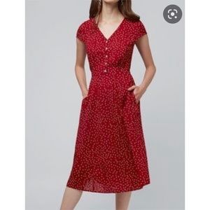 Louche polka dot midi dress